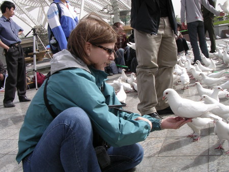 Me in China feeding the doves