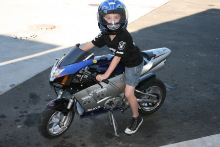 Wesley ont he motorcycle #3.