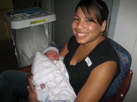 My Daughter Sara holding baby Xavier