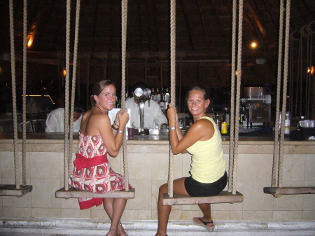 My cousin, Bri and I at the swing bar in Cancun