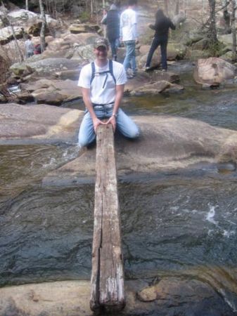 Me steadying the log for friends to cross!