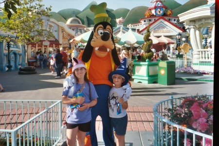 My Kids at Disneyland.. and some Goofy guy