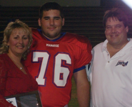 My son Michael and husband Mike.  Senior Night 11/05