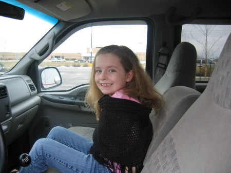 My daughter Miranda in my truck