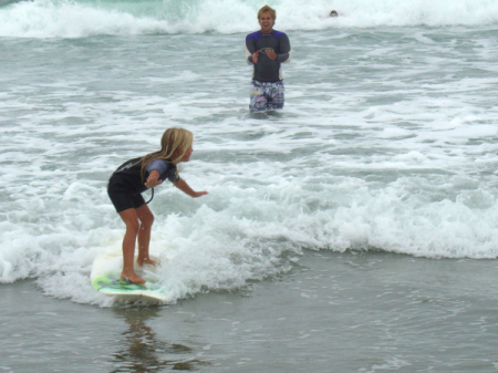 Liv surfing and me helping