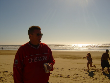 Husband Ken at Pismo Beach McKayla in the background