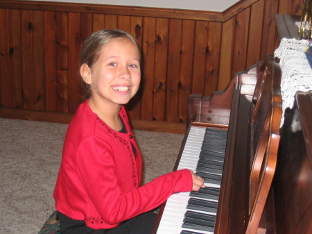 My daughter Kalei, playing the piano