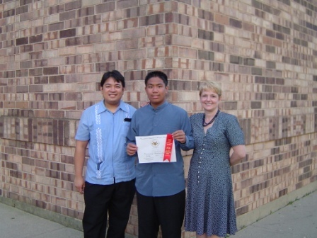 My son, my wife, and I after my son's Elementary school graduation