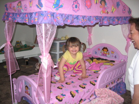 Sarah in her new big girl bed