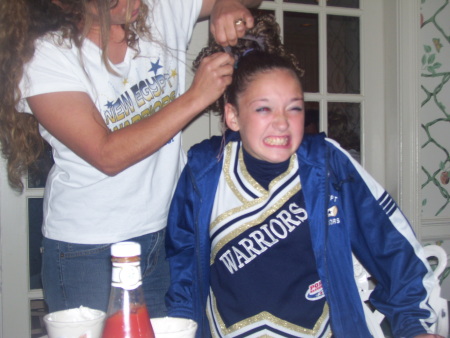 Me taking amanda's curles out they won!!!!