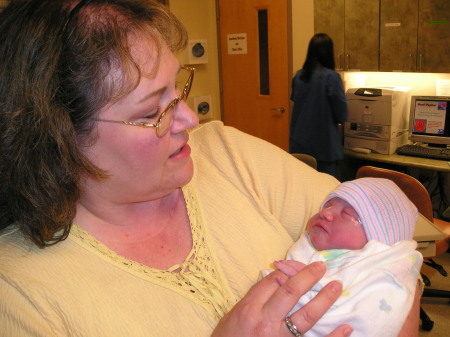 with my grandson, just two hours old.