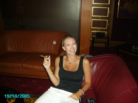 Trying a cigar...............not for me....