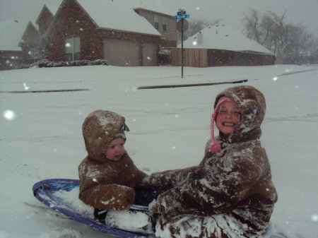Colton & Rylee sledding  dec.2009