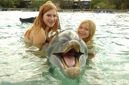 My Daughters in Honduras w/ Dolphins