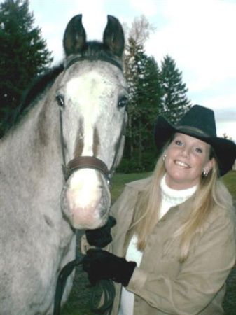 Daughter Wendy with her appaloosa, Aquila.