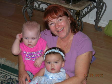 My wife Debra and 2 of our 7 grandbabies.