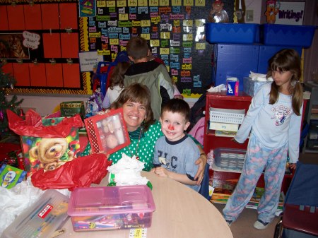 My son and his teacher at his 1st grade X-Mas party.