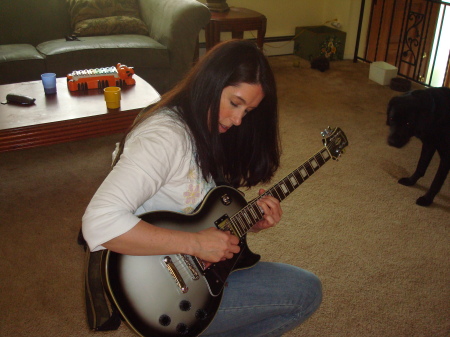 playing guitar at home