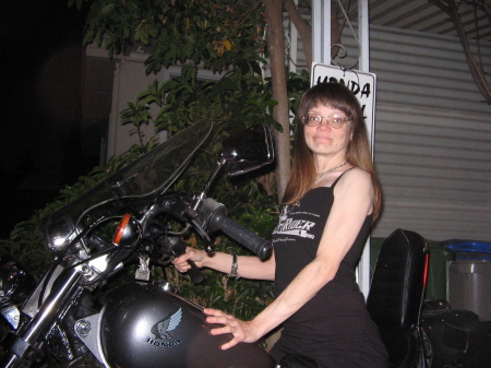 My wife Ivy, and her old motorcycle