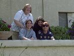 Anita behind daughters and friend 2001