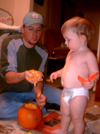 jess and troy carving pumpkins