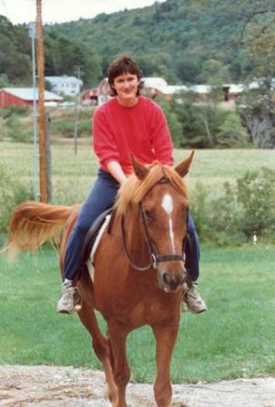 Marsha (my partner) and a horse named John