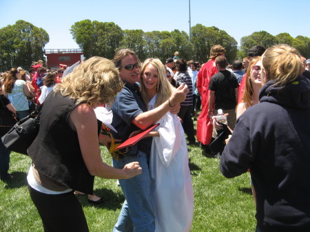 Kelsey grad hug