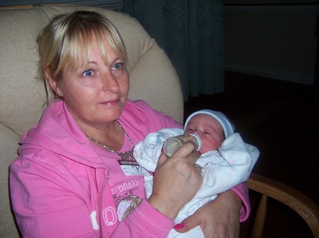 Me and my new Grandson not a very good pic of me