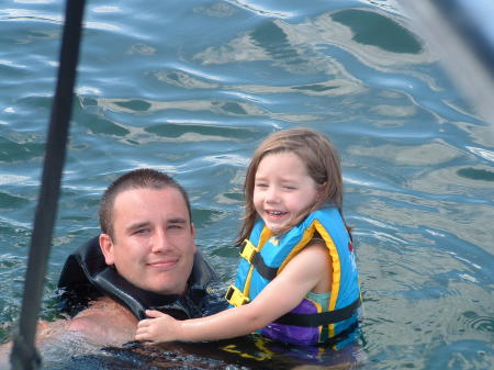 Hannah swimming with her daddy at Table Rock Lake