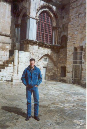 Standing at the entrance of the Church of the Holy Sepulchre