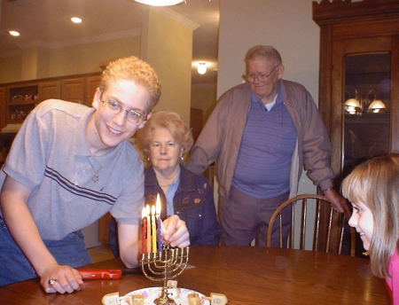 Tavish Lights the Menorah on Hannukah - 2005