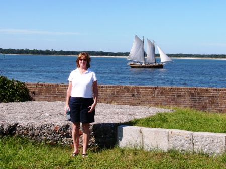 mo at the fort w - ship in background