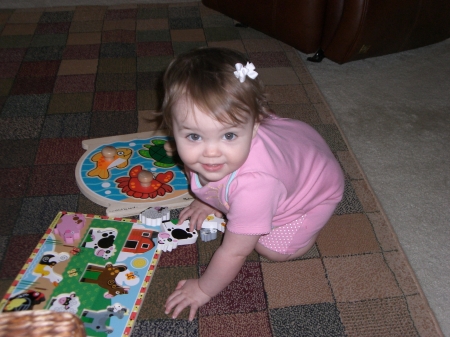 Amanda playing with puzzles