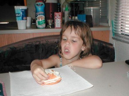 My Granddaughter eating in the RV!