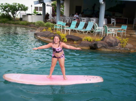 Daughter learning to surf