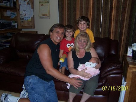 Wife and I with Grandchildren