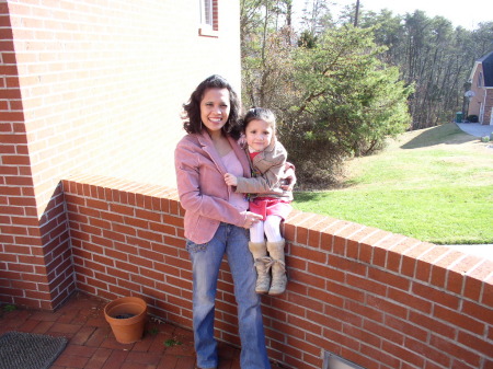 My wife, Yanti & my daughter Juliana on the front porch.