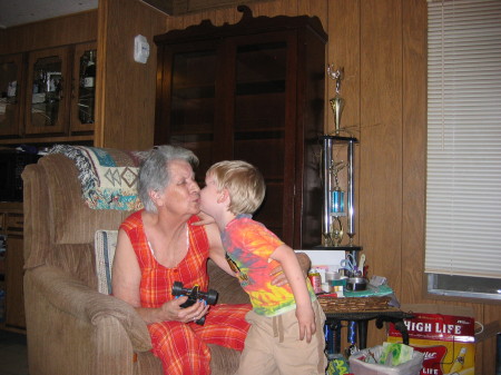 My Mom aka Granny stealing a rare kiss from our grandson Landon.