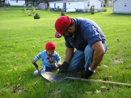 My son and I cleaning tools in the fall of 2005.