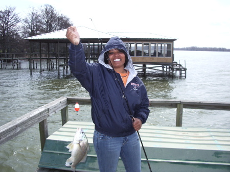 Ashley fishing at our lakehouse in Ark