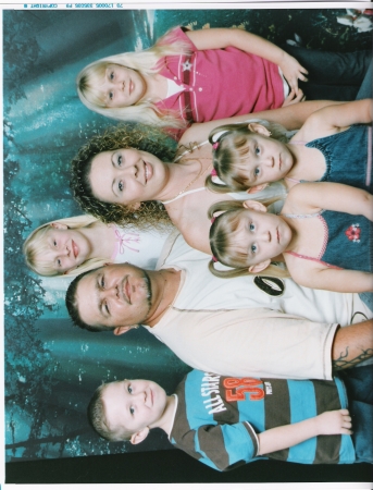 Me and my fiance and his two girls and my three children.