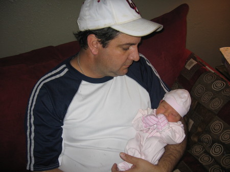 My husband, Charles, and our little granddaughter, Cailynn.