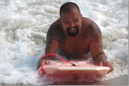 My Husband body surfing in New York