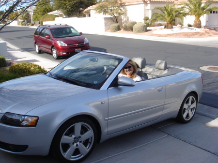 The 50 year old woman in her sports car!