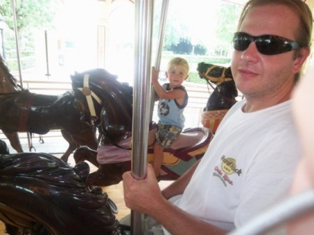 Shawn and my little guy on the carousel