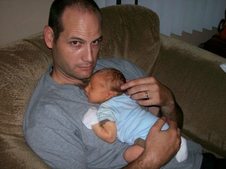 Sawyer 5 days old and sleepy daddy