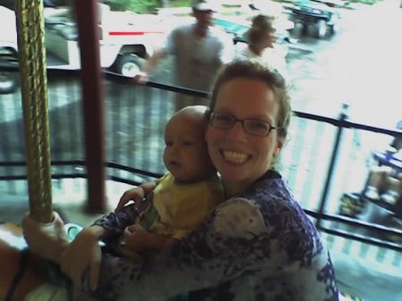 Owen's first merry-go-round ride