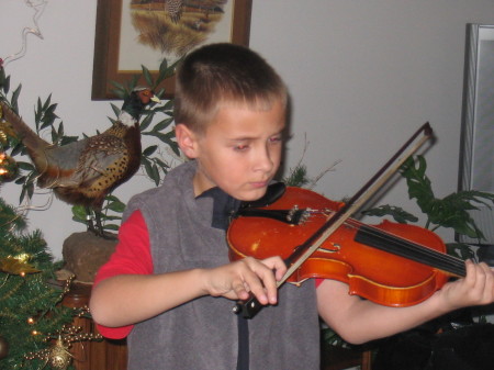 My oldest son, Adrian, playing his violin