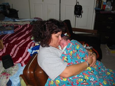 first time holding my grandson Nickolas