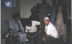 Tim distributing wheelchairs Kabul, Afghanistan June 1999